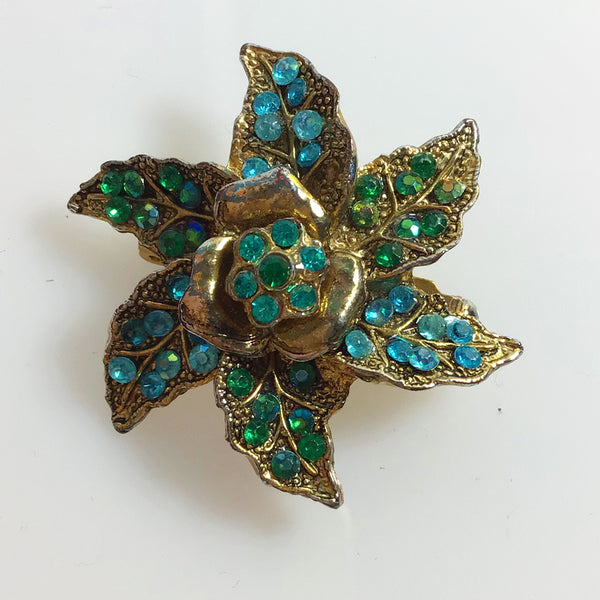 Green and blue rhinestone floral star brooch
