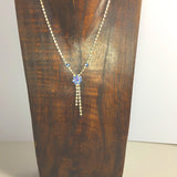 Diamante necklace with iridescent flower drop