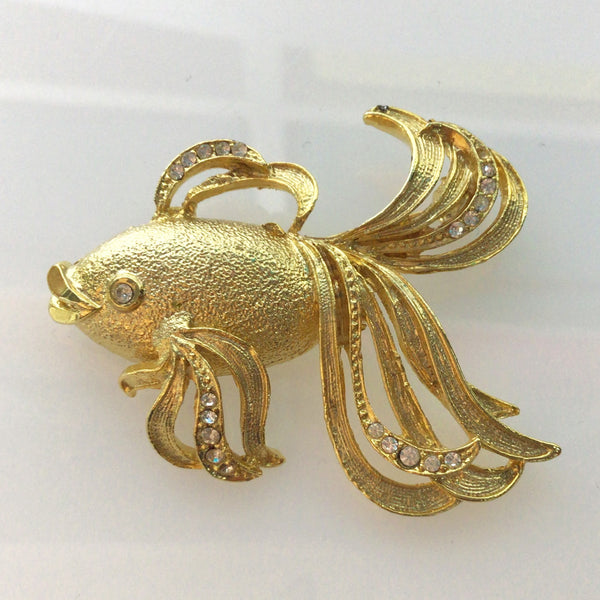 Gold tone fantail fish broch with crystals