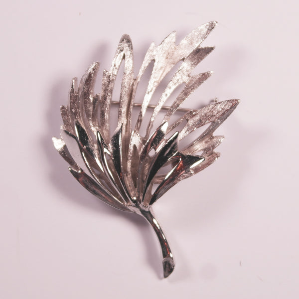 Textured and polished silver tone leaf brooch